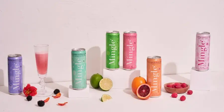 Adaptogenic drinks from Mingle showcased with fresh fruits and elegant glasses for a colorful wellness display