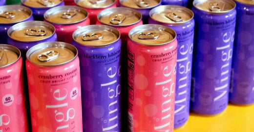 Mocktails for weddings in cranberry and blackberry flavors displayed in rows