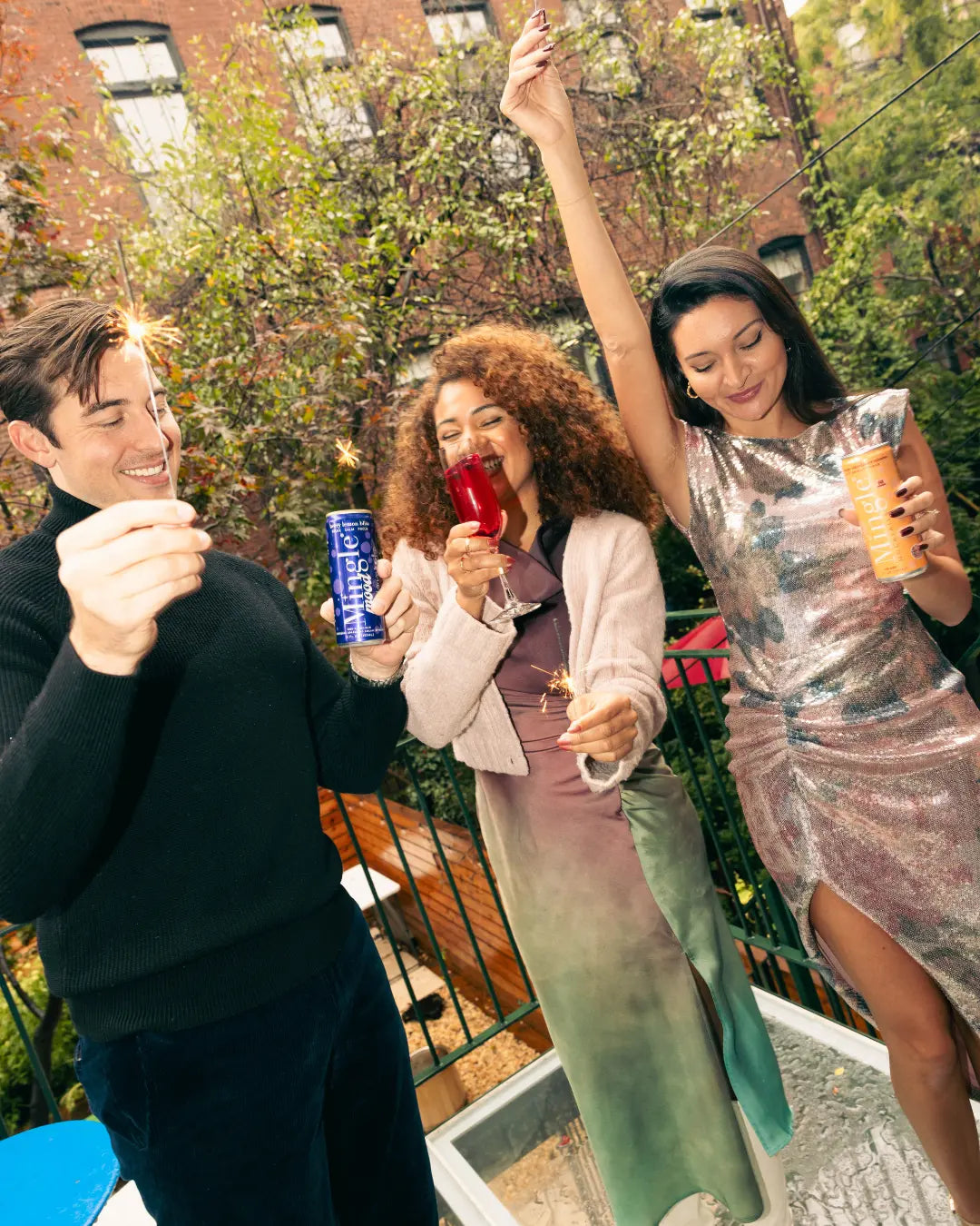 People celebrating together with mingle mocktails and mingle mood