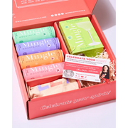 Mingle mocktail gift box containing four canned mocktails, a Key Lime Margarita mix, discount card, and a branded tote bag, all packaged in a vibrant red box with celebratory branding