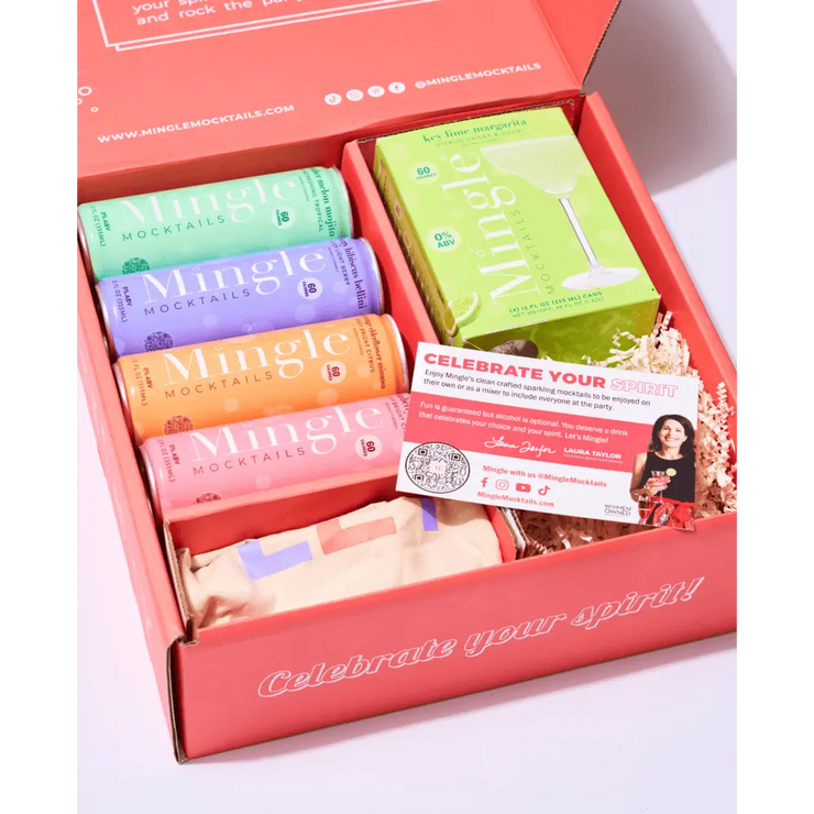 Mingle mocktail gift box containing four canned mocktails, a Key Lime Margarita mix, discount card, and a branded tote bag, all packaged in a vibrant red box with celebratory branding